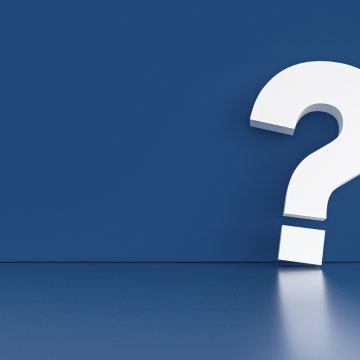 open-back headphones white question mark blue background